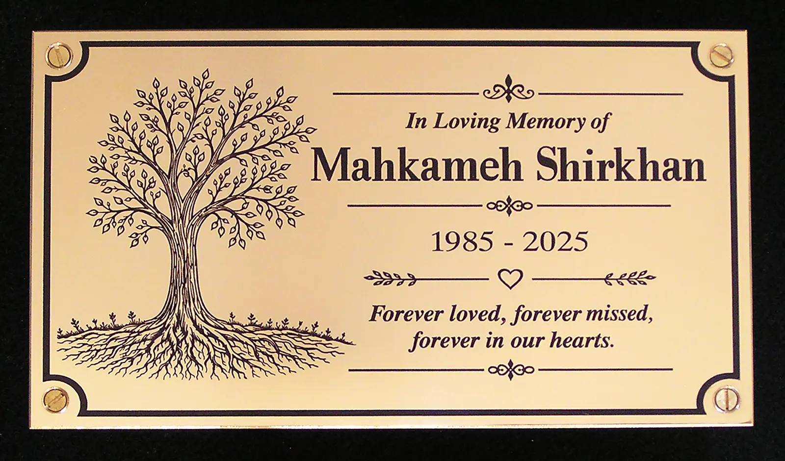Brass memorial plaque with engraved tree design by Furnells